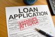 istockphoto_11975157-approved-loan-application-on-a-desktop.jpg